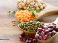 variety of dry beans on spoons