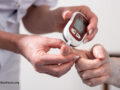 person getting blood sugar tested