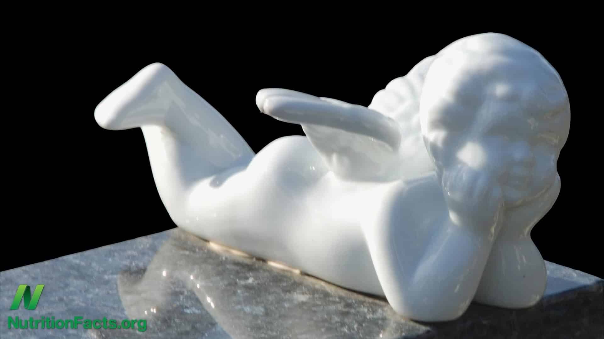 white porcelain cherub