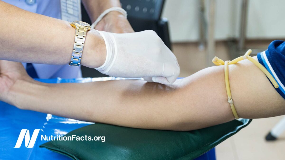 nurse taking blood