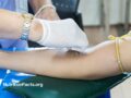 nurse taking blood