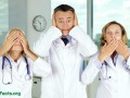 three doctors lined up: one covering their eyes, one covering their ears, and one covering their mouth