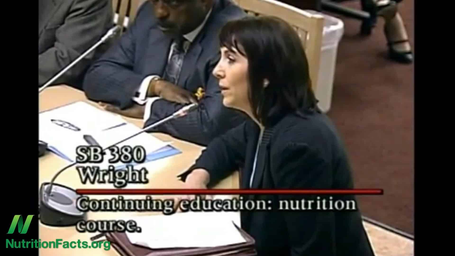 person speaking at a hearing