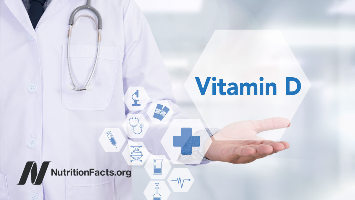 doctor in lab coat with words vitamin d