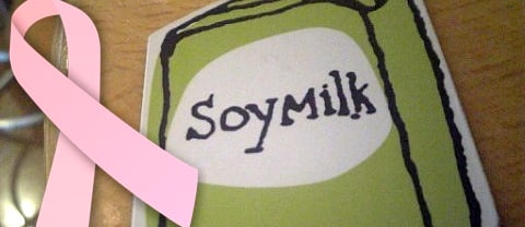 breast cancer ribbon next to an illustration of a carton of soy milk
