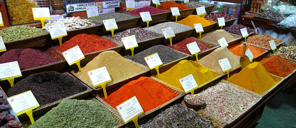 containers of various spices in a shop