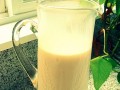 glass jug of vanilla-sweetened almond milk