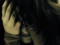 person with their head in their hands