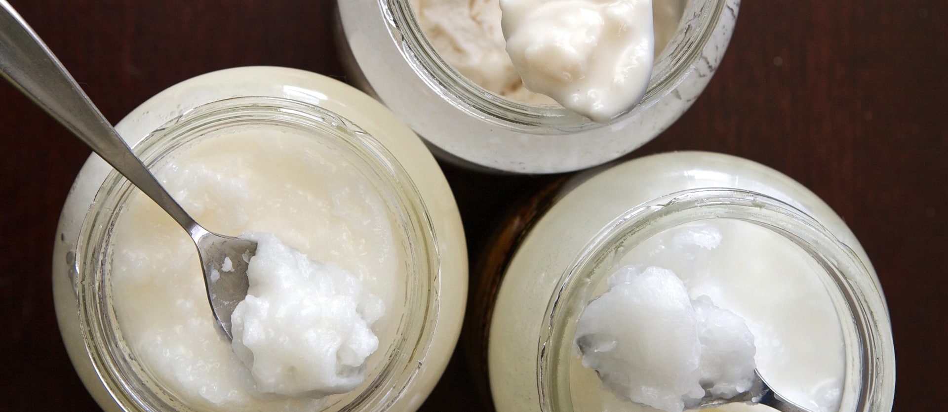 three jars of coconut oil