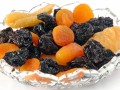 crystal bowl of dried prunes and apricots