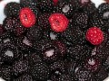 plate of blackberries and raspberries