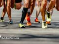 the feet of a group of runners