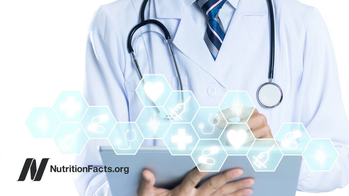 doctor looking at a tablet