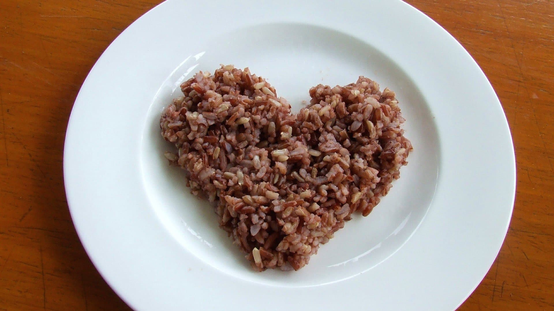 plate with rice shaped into a heart
