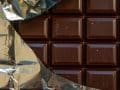 partially unwrapped bar of chocolate