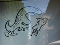 illustration of a monster labelled "diabetes" growling at a person