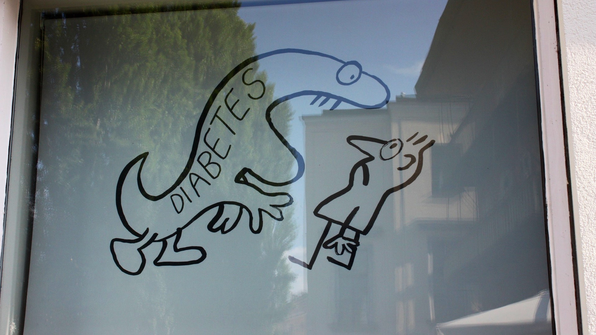illustration of a monster labelled "diabetes" growling at a person