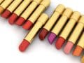 rows of various colors of lipstick