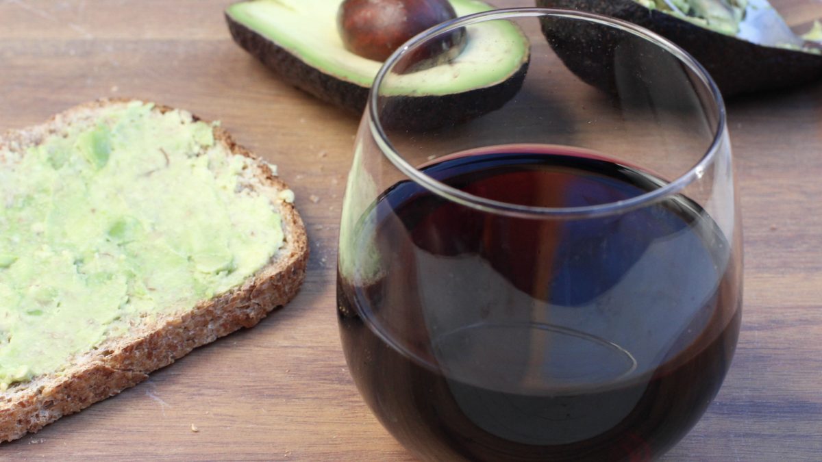 avocado toast and a glass of red wine