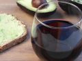 avocado toast and a glass of red wine