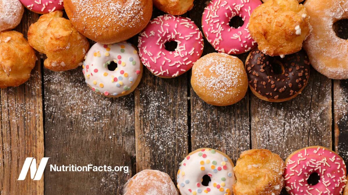 assorted donuts on wood table