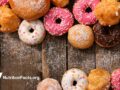 assorted donuts on wood table
