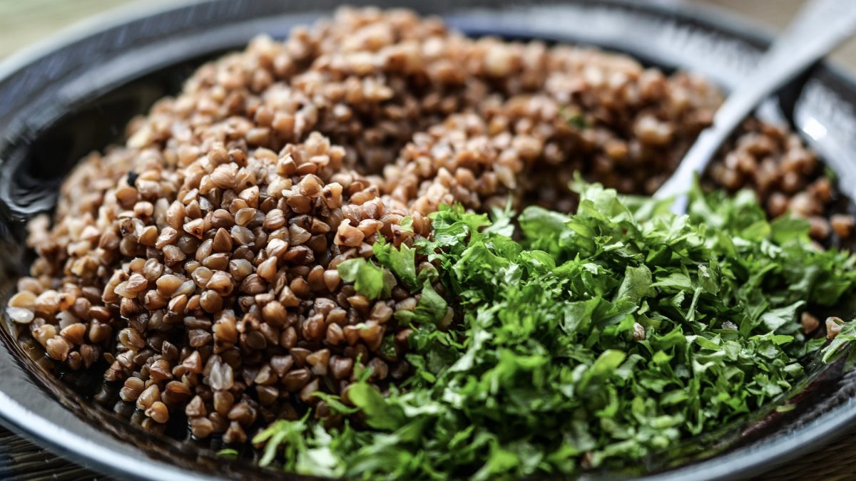 bowl of whole grains and greens