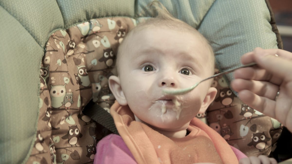 baby being spoonfed