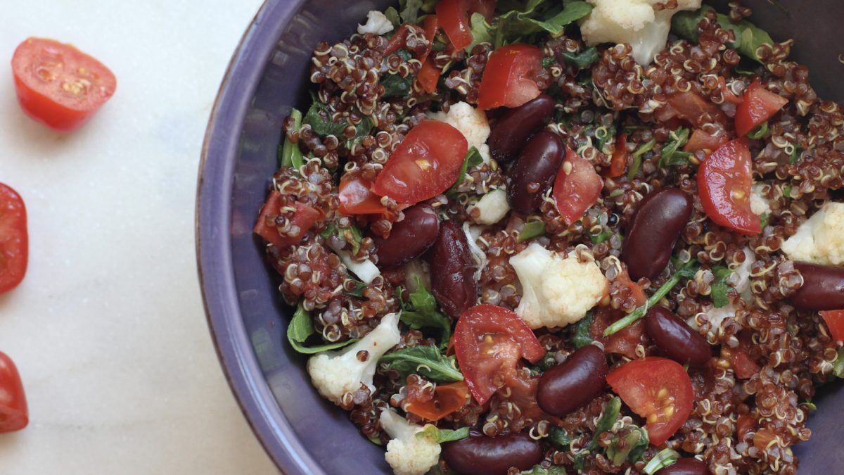 bowl of quinoa, vegetables, and beans