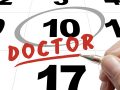 calendar with date circled and "doctor" written on it