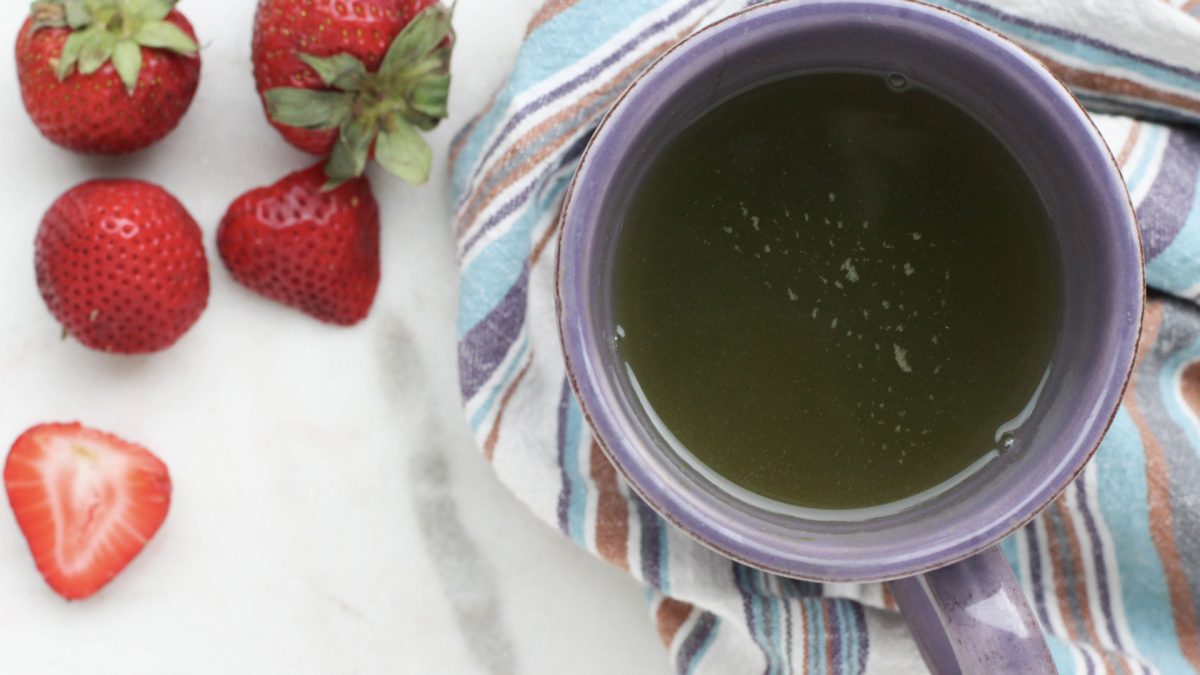 strawberries and filled teacup
