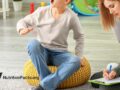child sitting on a bean bag in a therapy session