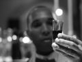 person holding a shot glass