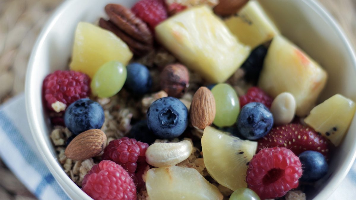 bowl of various fruit and nuts