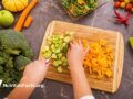 hands chopping vegetables