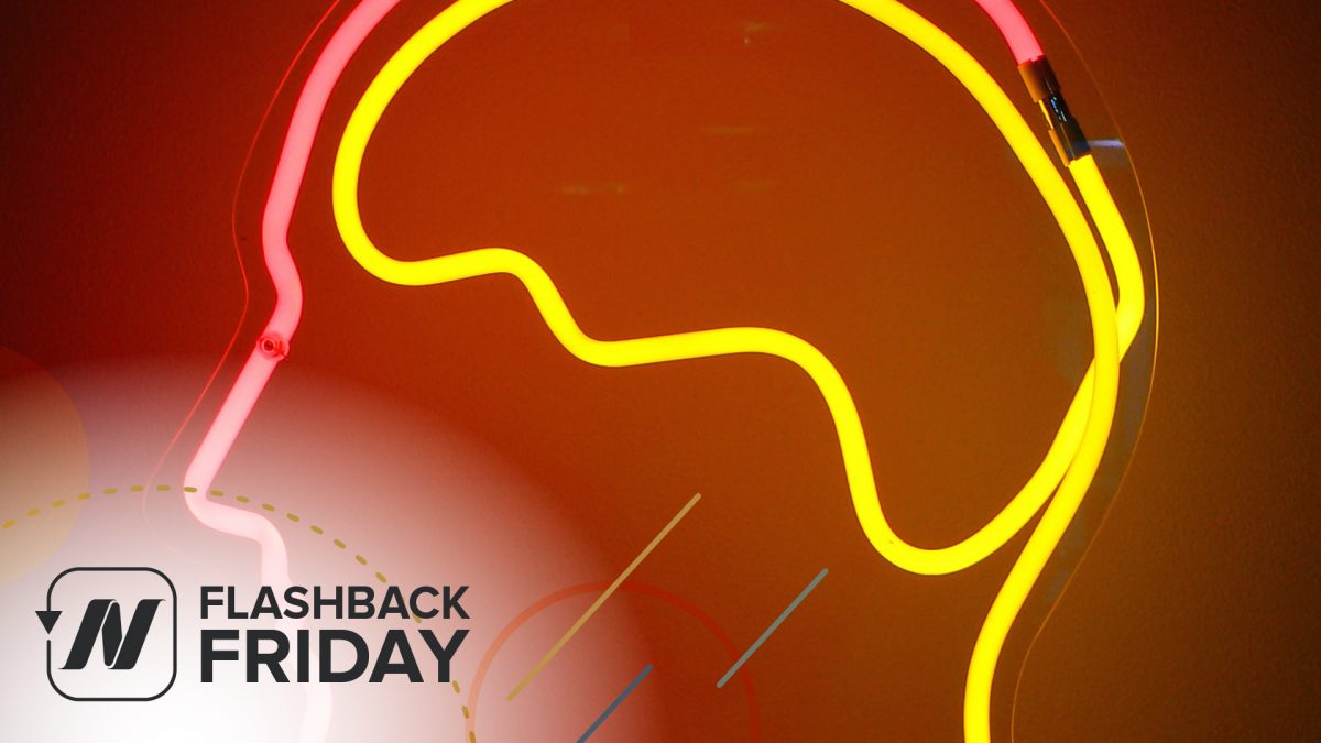 neon light shaped into a head and brain