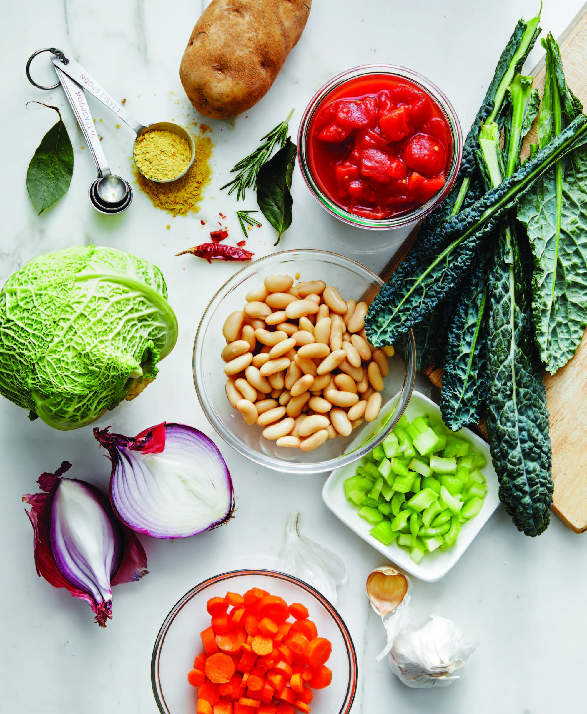 beans, vegetables, herbs, and spices that are the ingredients for ribollita