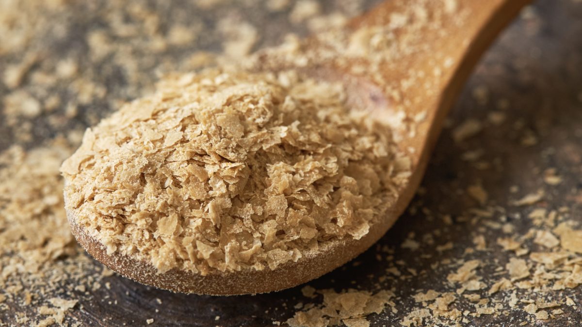 Nutritional yeast on a spoon