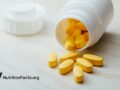 Yellow supplement pills