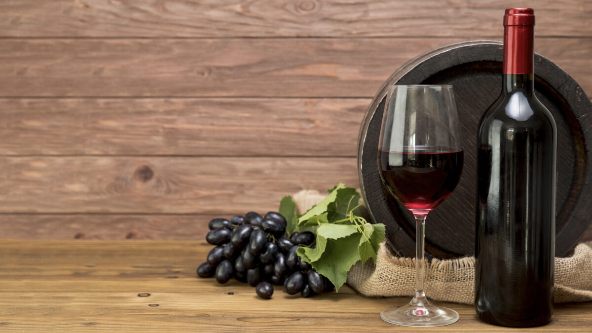 Red wine glass and grapes