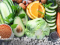 a pile of fresh foods on a grey counter