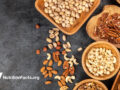 assortment of nuts over grey surface