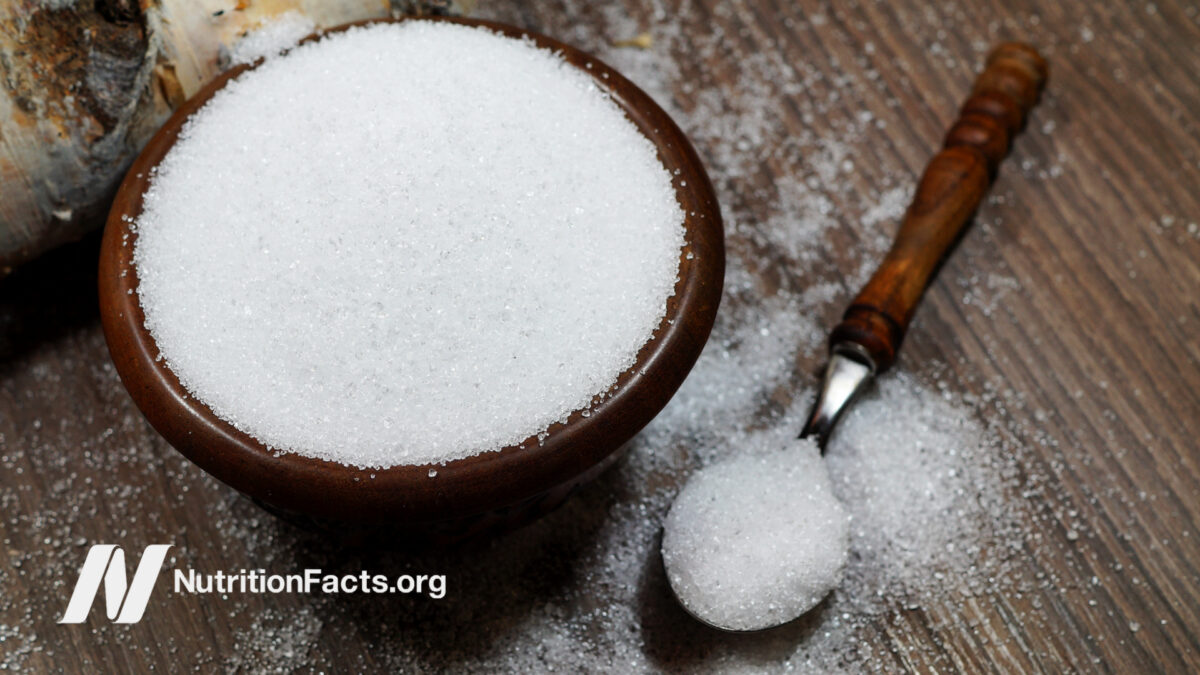 Bowl of sweetener on wooden countertop