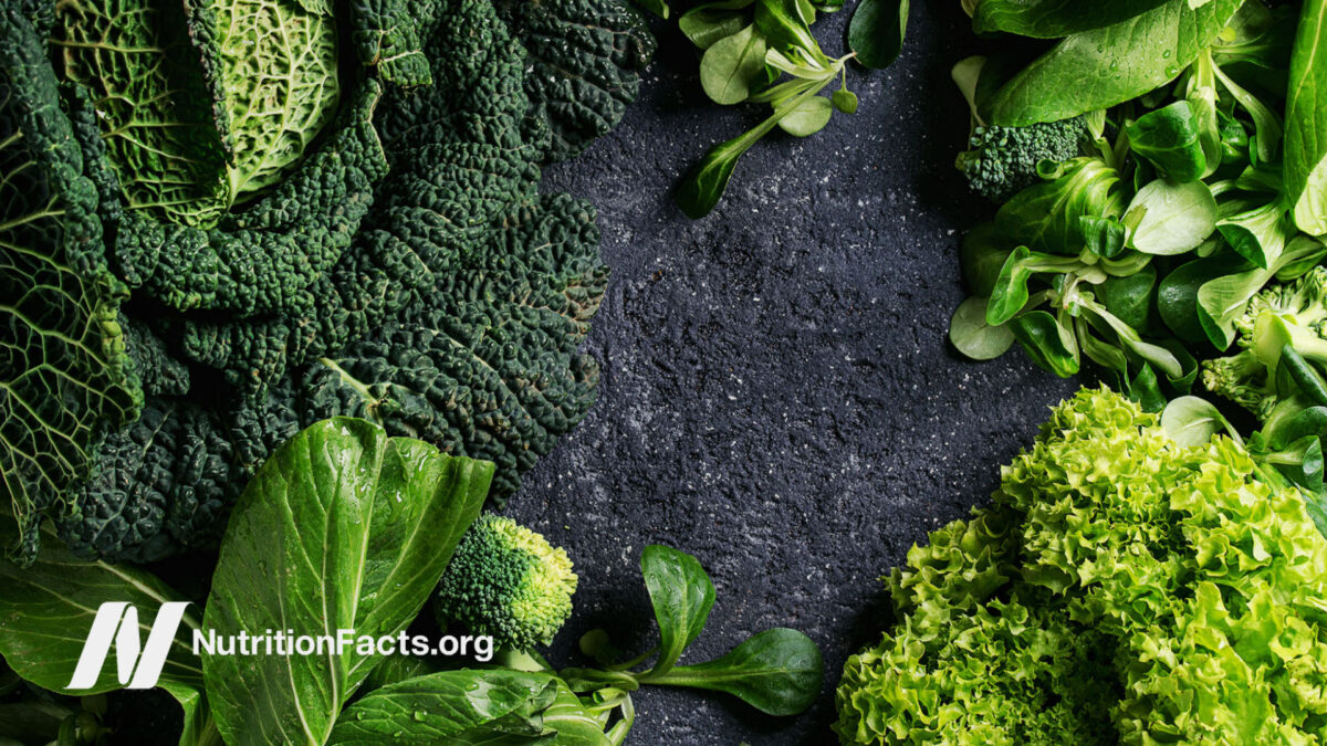 Assorted green cruciferous on a slate surface
