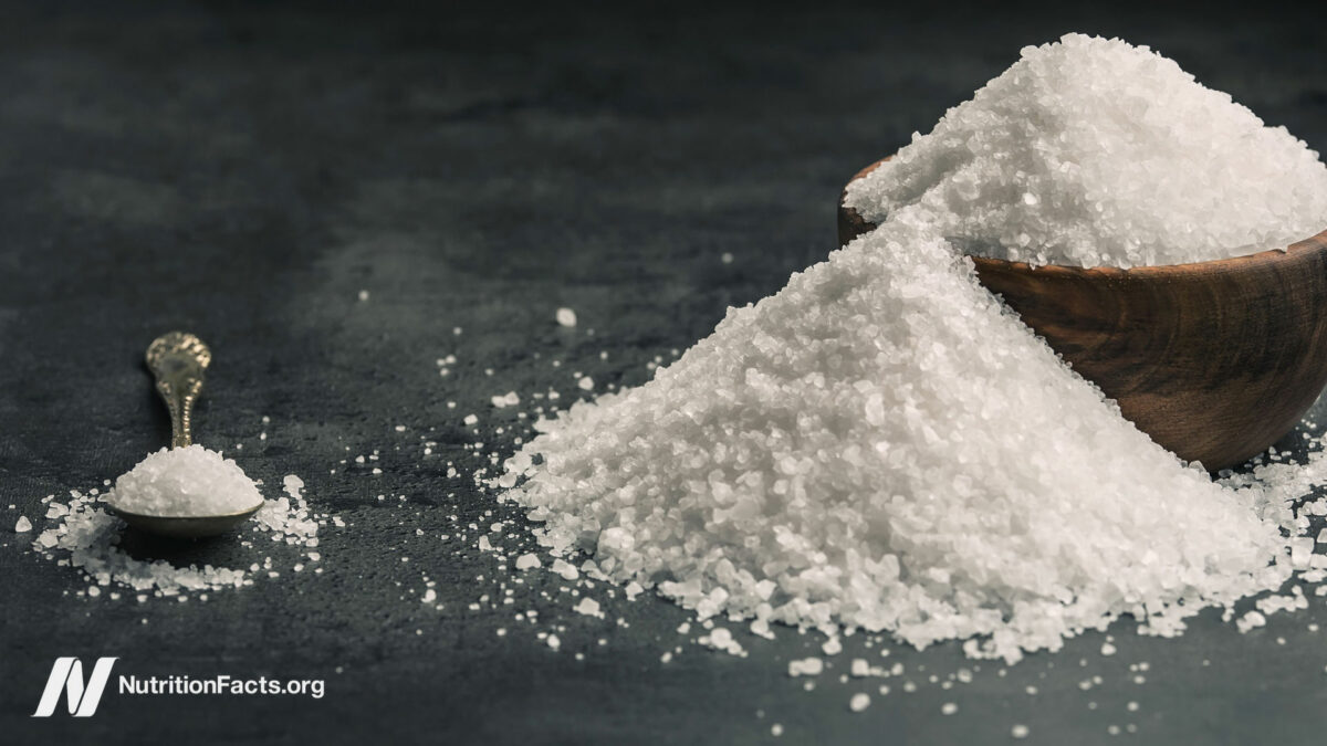 Sweetener piled up around a bowl and a spoon