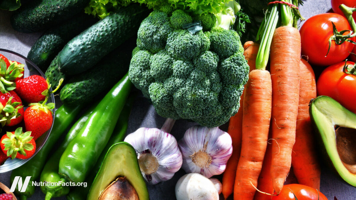 Arrangement of vegetables and fruits in a sunny environment