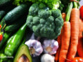 Arrangement of vegetables and fruits in a sunny environment
