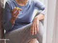 Woman eating avocado toast