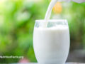 Milk being poured into a glass