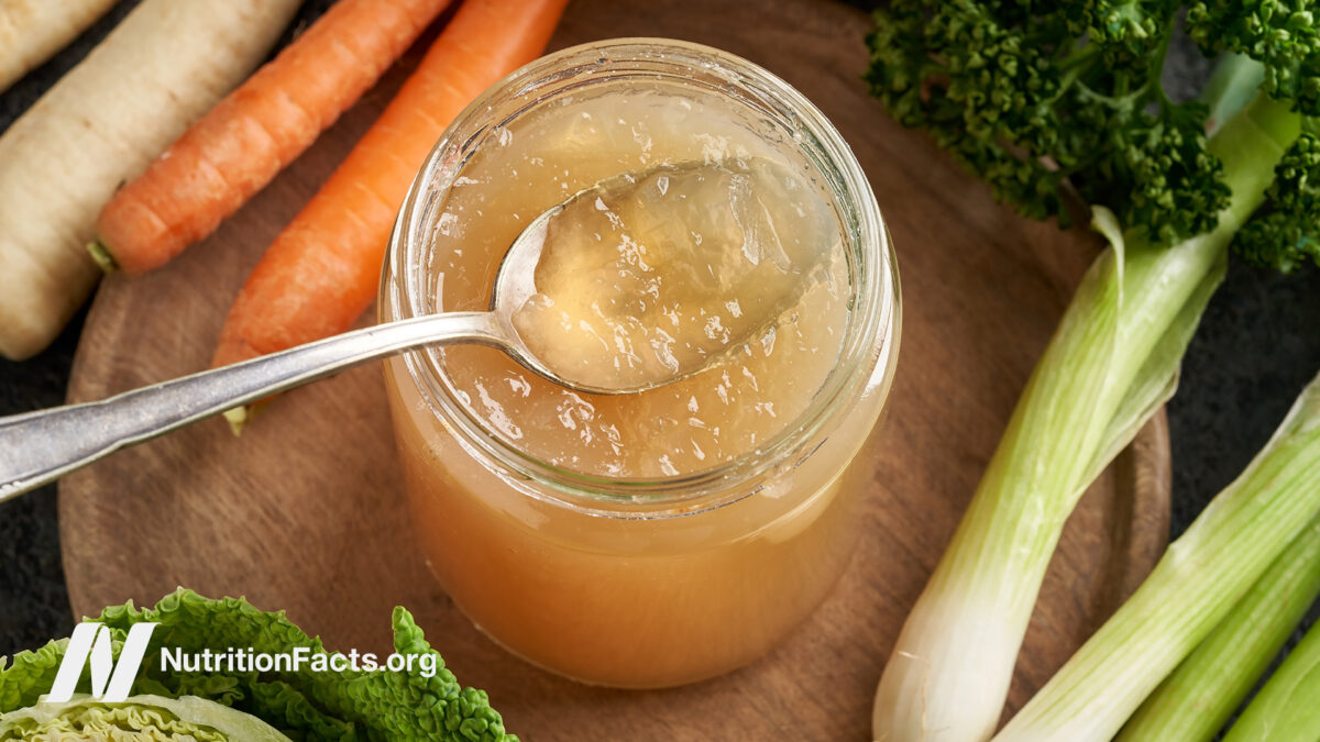 Jar of jelly consistency product with a spoon